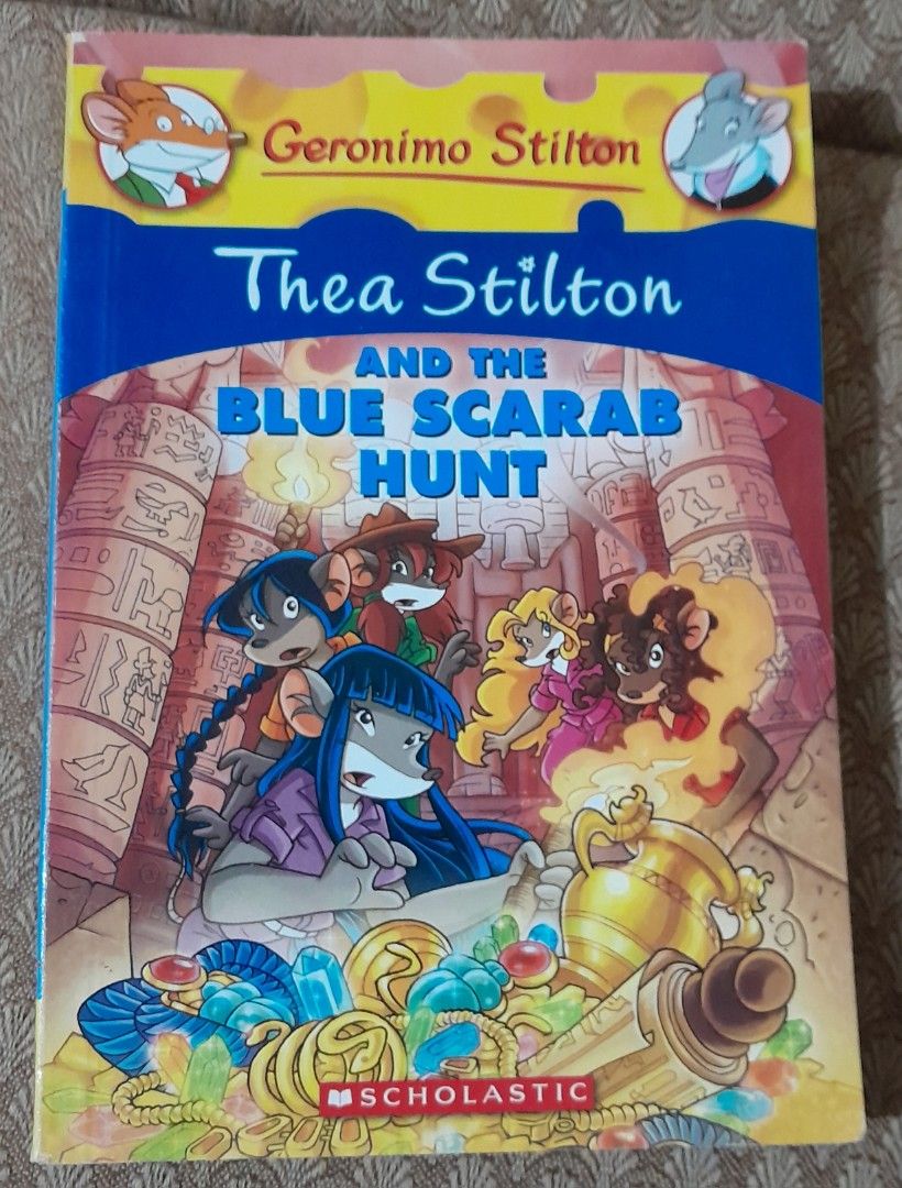 Geronimo Stilton Books - Set of 3 (Category: Children's Books) located in Mandaluyong City. Submitted by twixie94147 (Listing ID 1425555260, Image 2). Description: Set of three Geronimo Stilton books. Titles include "Thea Stilton and the Blue Scarab Hunt", "Valley of the Giant Skeletons", and "Wedding Crasher". These books are from the Scholastic series. Perfect for young readers who enjoy adventure and mystery stories. Each book features colorfu