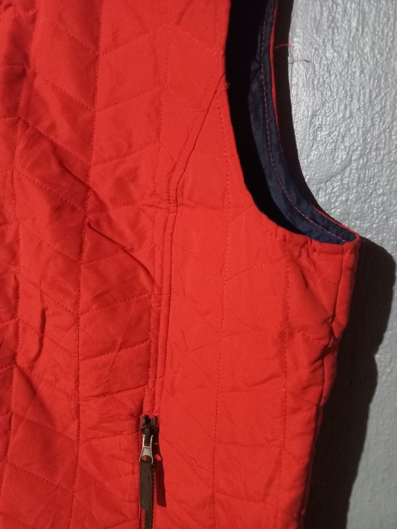 G.H. Bass quilted vest (Category: Vests) located in Taguig. Submitted by jeicollective (Listing ID 1425580367, Image 2). Description: size L on tag orange color used, no issues width: 21" length: 24.5" 350.