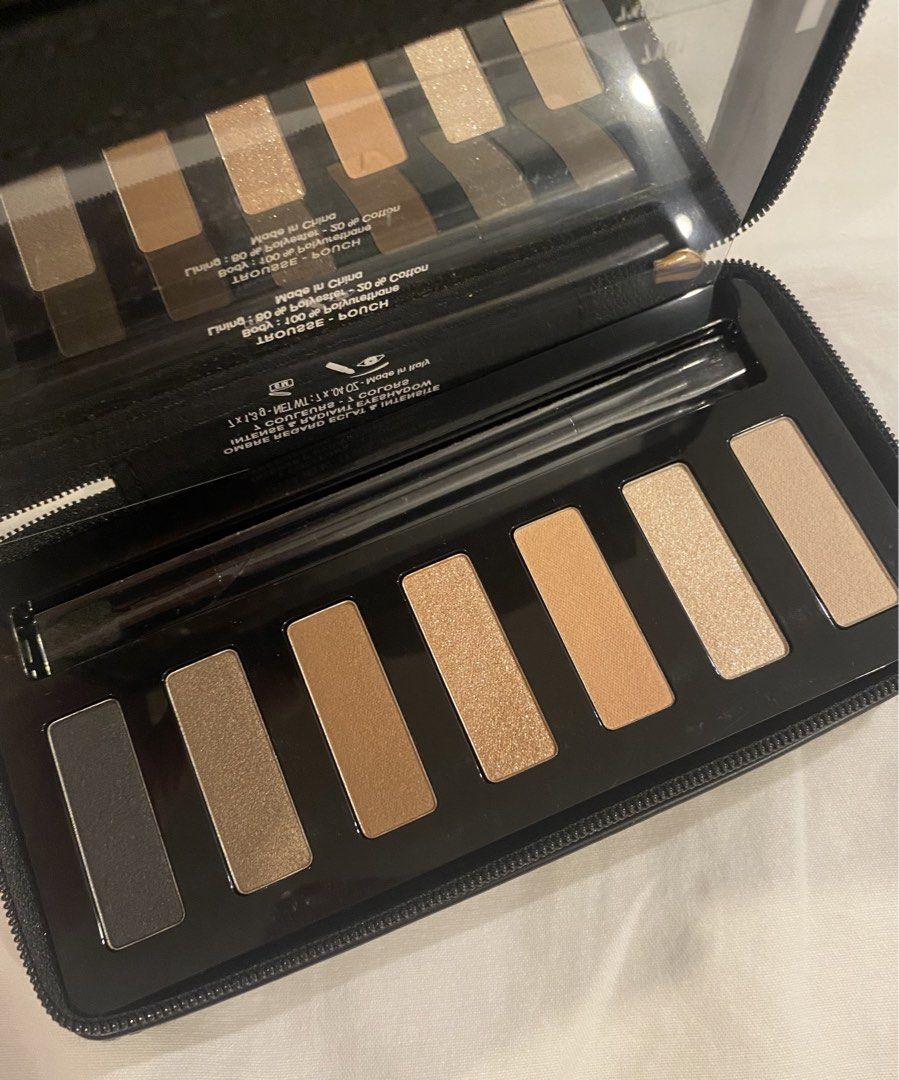 Givenchy Ombre Eclat & Intensite Eyeshadow Palette (Category: Makeup) located in Pasay City. Submitted by trendystash (Listing ID 1425608425, Image 3). Description: Brand new No box Givenchy eyeshadow palette with 7 radiant colors. The palette is in a black pouch with a mirror and a brush. The pouch has a gold and black design with the Givenchy logo. Made in Italy..