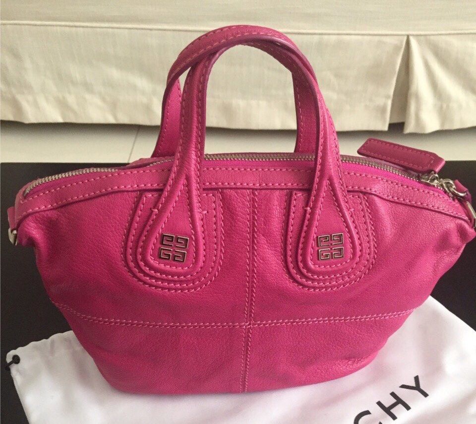 Givenchy Pink Micro Nightingale Goatskin Handbag (Category: Luxury Bags & Wallets) located in Makati City. Submitted by iamstorm77 (Listing ID 1425492058, Image 1). Description: Super cute! Complete with sling strap, cards and dust bag. Used lightly, no smell. Additional photos upon request. DF c/o buyer. Serious buyers only.