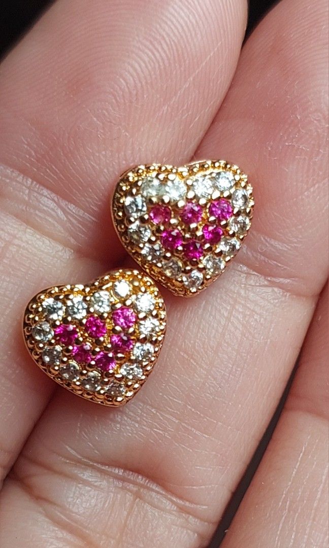 Gold Stud Earrings Set (Category: Earrings) located in Gapan. Submitted by purseofjune (Listing ID 1425482600, Image 2). Description: heart stud ruby and white stone P400 flower stud yellow stone P300 flower stud ruby P400 set for P800 in gold plated copper, ruby stone is uv reactive hypo allergenic long lasting plating with proper care.