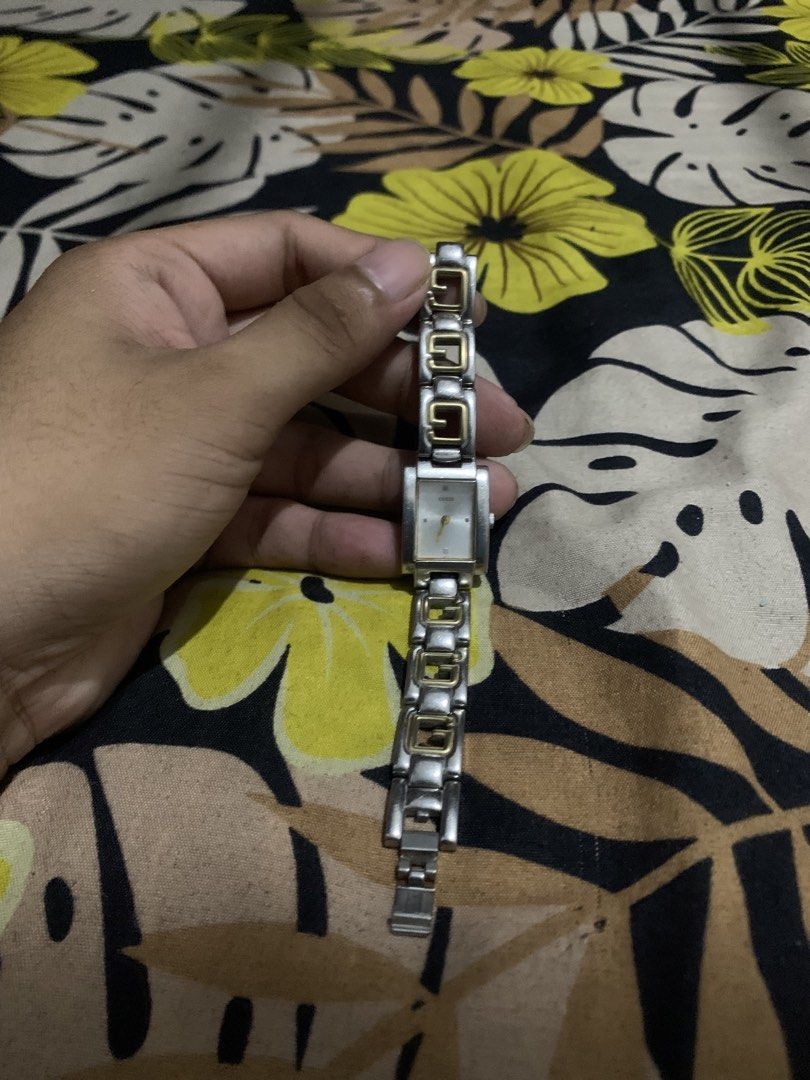 Vintage Guess Ladies Watch (Category: Women's Watches) located in San Juan, La Union. Submitted by declutteringog7 (Listing ID 1425487182, Image 3). Description: Title: Vintage Guess Ladies Watch Issue:Not Working Description: ✅ BATTERY ✅ Authentic Guess Watch ✅ Classic Two-Tone Design (Silver & Gold) ✅ Elegant and stylish look ✅ Good condition Note: • Clasp/Lock needs minor repair or replacement Working pero kailangan lang ipagawa yung lock, mur