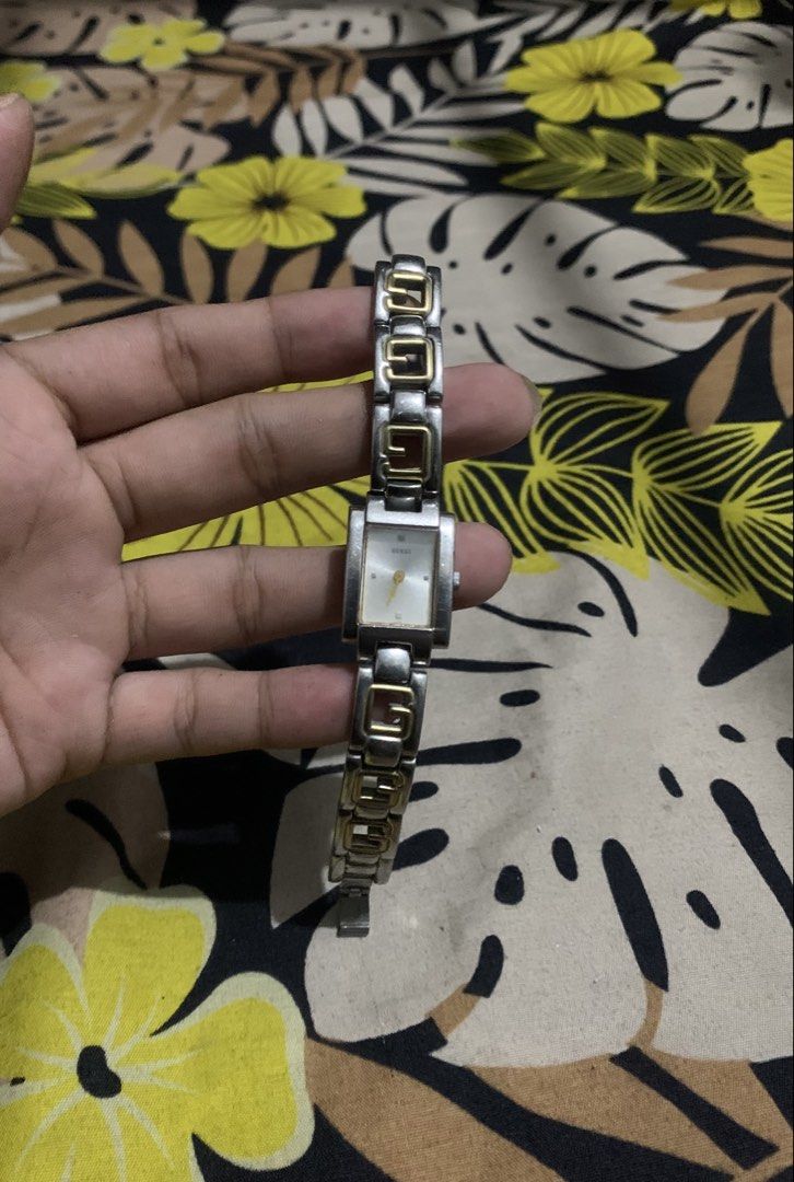 Vintage Guess Ladies Watch (Category: Women's Watches) located in San Juan, La Union. Submitted by declutteringog7 (Listing ID 1425487182, Image 2). Description: Title: Vintage Guess Ladies Watch Issue:Not Working Description: ✅ BATTERY ✅ Authentic Guess Watch ✅ Classic Two-Tone Design (Silver & Gold) ✅ Elegant and stylish look ✅ Good condition Note: • Clasp/Lock needs minor repair or replacement Working pero kailangan lang ipagawa yung lock, mur
