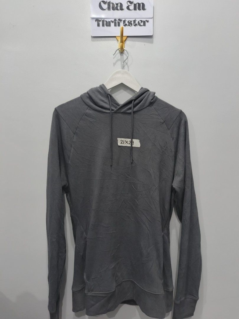 Gymshark Hoodie - Gray (Category: Hoodies) located in Leyte. Submitted by chaem89 (Listing ID 1425589998, Image 1). Description: Gray Gymshark hoodie. Features the Gymshark logo on the back. The size is S. Made in Madagascar. The material is 70% cotton, 30% recycled polyester for the hood lining, 95% polyester, and 5% elastane. -As new cond (no issue) Fresh from bale -sz S on tag 21x29.