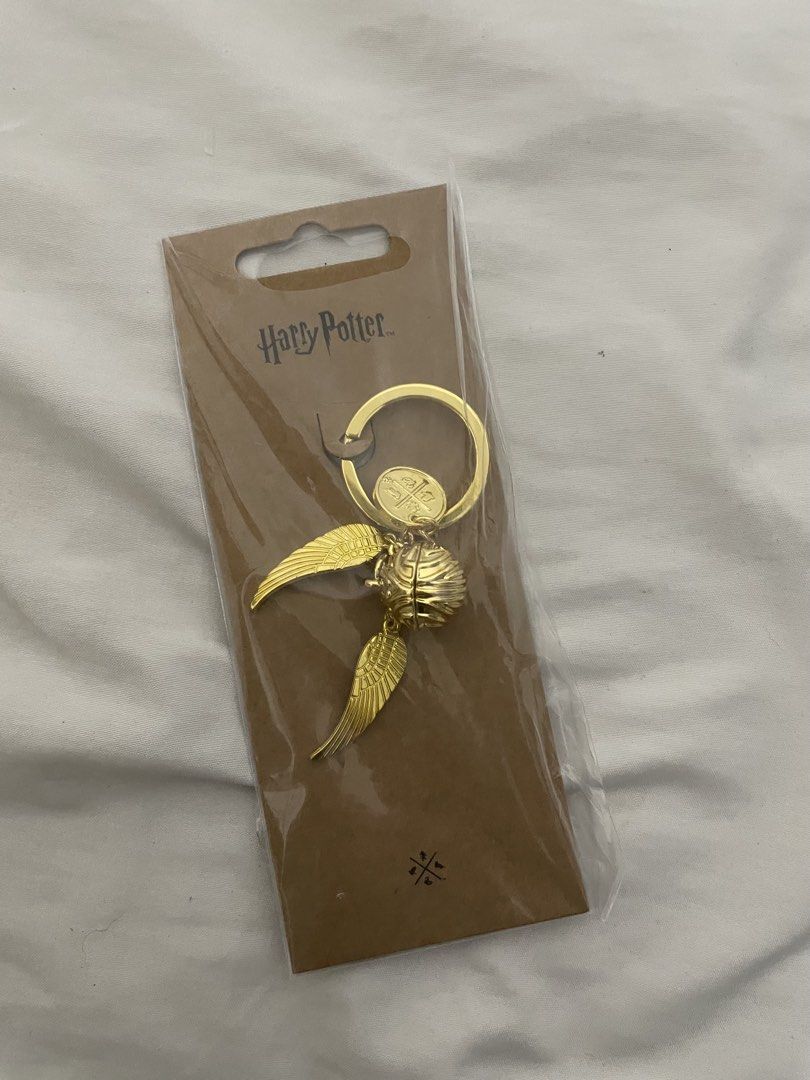 Harry Potter Golden Snitch Keychain (Category: Western Merchandise) located in Makati City. Submitted by odimails (Listing ID 1425490071, Image 1). Description: 🌟 Harry Potter Golden Snitch Keychain 🌟 Bought from Harry Potter Studio Tokyo 🌟 location: Makati City / Parañaque City 🌟 same day delivery/gogo express/j&t 🌟 dm for more details!.
