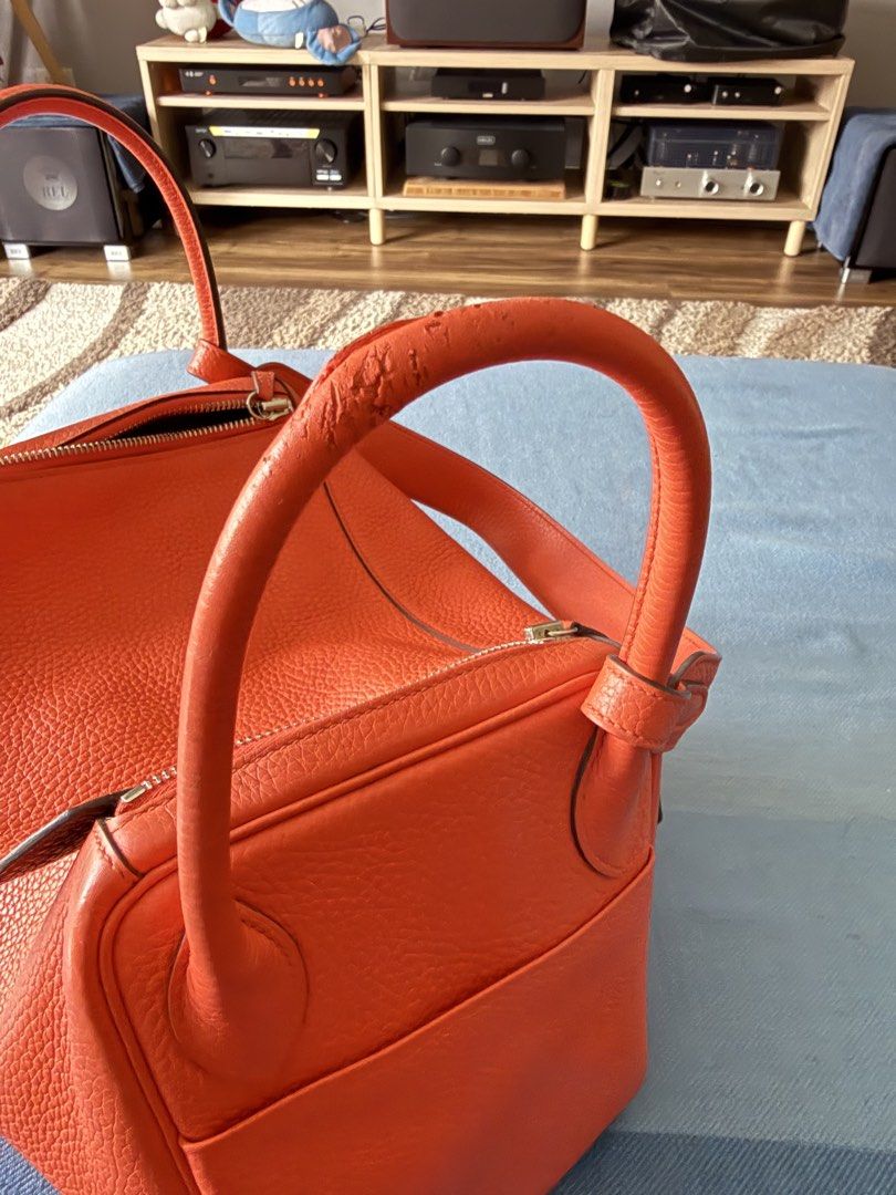 Hermes Lindy 30 (Category: Luxury Bags & Wallets) located in Quezon City. Submitted by muffin217 (Listing ID 1425480274, Image 3). Description: - Hermes Lindy 30 handbag - Orange Clemence leather exterior - Burgundy interior - Classic Lindy design - Size: 30 - Available for pick-up or Lalamove.
