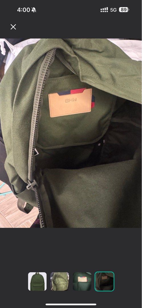 hershel bhw backpack （分類：背包）位於 Hong Kong。 由 codyfinley 提交（商品編號 1425517721，圖片 4）。簡介： Green backpack with a front pocket and a top handle. The interior features a card holder. The backpack has a zipper closure. The colour is a solid green.。