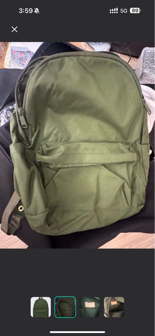 hershel bhw backpack （分類：背包）位於 Hong Kong。 由 codyfinley 提交（商品編號 1425517721，圖片 2）。簡介： Green backpack with a front pocket and a top handle. The interior features a card holder. The backpack has a zipper closure. The colour is a solid green.。