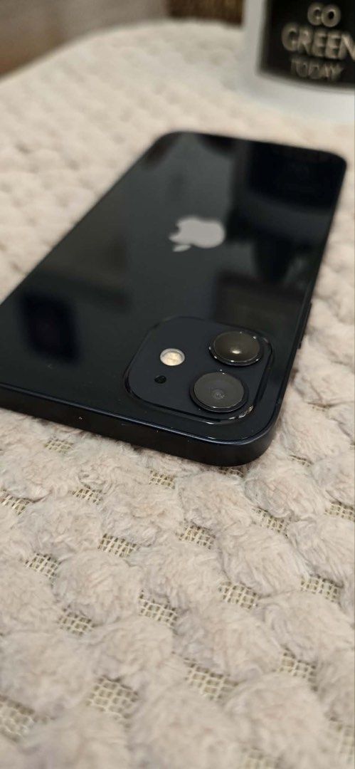 iPhone 12 Black (Category: iPhone 12 Series) located in Pasig City. Submitted by da_stone (Listing ID 1425545752, Image 2). Description: FOR SALE🗣️🗣️ iPhone 12 -Black —64 gb —Ntc Approved —true tone working —few dents and scratches —A14 Bionic chip — smooth performance for gaming —With Face Id —No issues —82 Battery Health —Globe locked Inclusions: Case and cord .