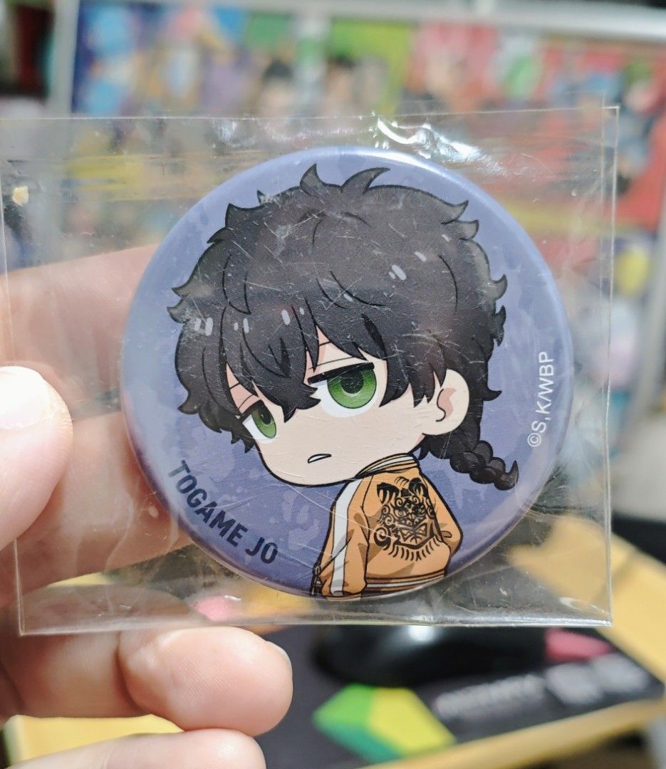 Jo Togame (Windbreaker) (Category: Coats, Jackets and Outerwear) located in Manila. Submitted by yourfavoritethings7 (Listing ID 1425514039, Image 1). Description: Togame Jo anime badge. It features a character with black hair and green eyes. The character is wearing an orange jacket with a tiger design on the back. The text "TOGAME JO" is printed on the badge..