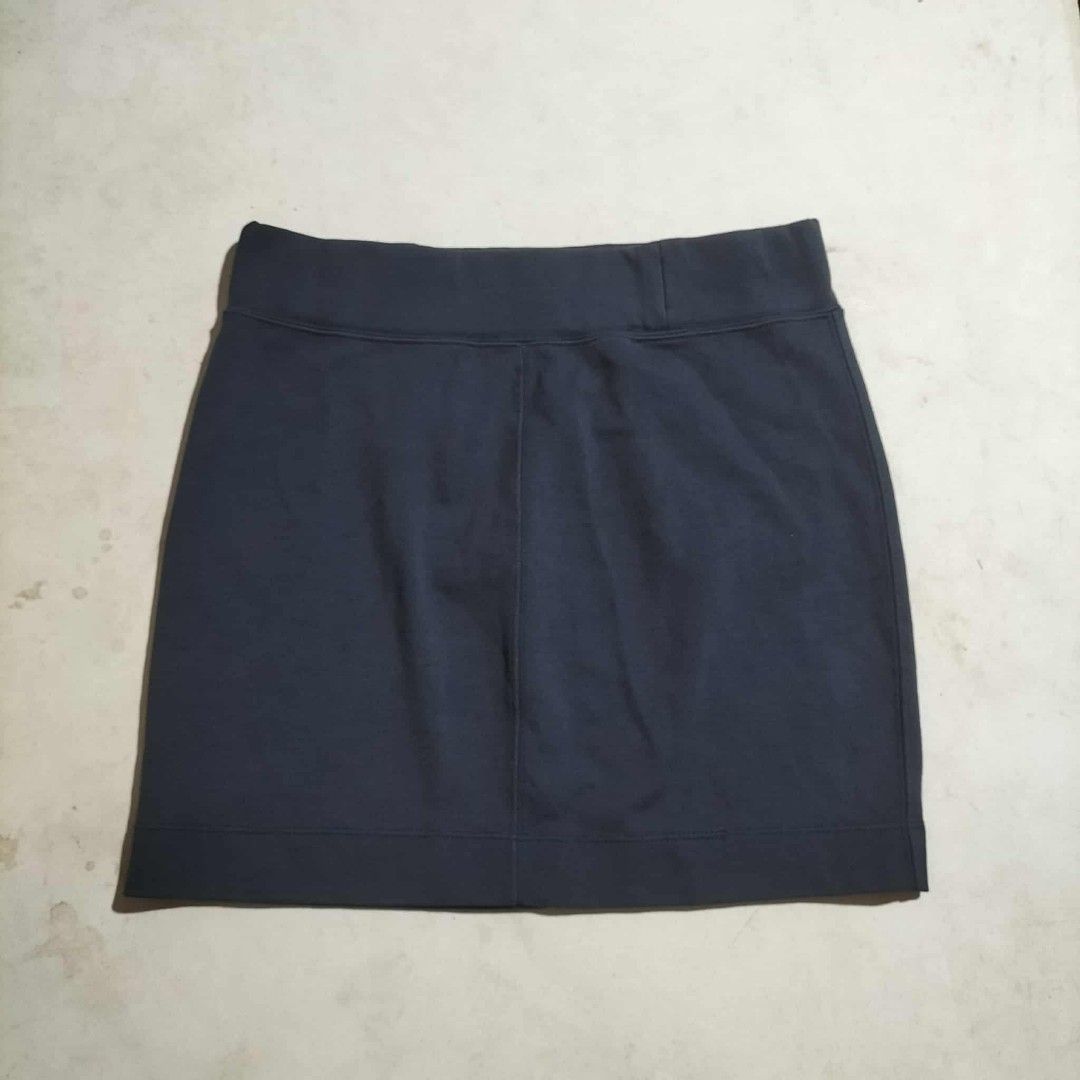 Lacoste Navy Blue Skirt Size 34 (Category: Skirts) located in Sindangan. Submitted by mix_thrift0308 (Listing ID 1425537073, Image 3). Description: Navy blue skirt from Lacoste. Features the iconic Lacoste logo on the front. The size tag indicates a size 34. Perfect for casual wear or light activities. The skirt has a simple, classic design..