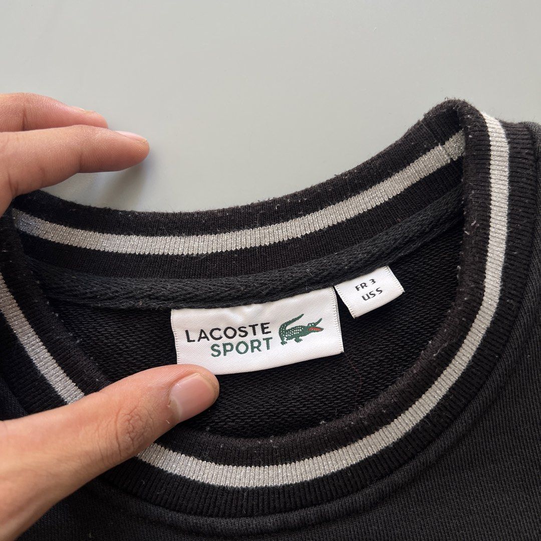 Lacoste Sport Black Sweatshirt (Category: Coats, Jackets and Outerwear) located in Imus. Submitted by cedrickger51562 (Listing ID 1425469186, Image 3). Description: Lacoste Sports Crewneck Gliters Small on tag 19.5 x 24 Excellent condition color rate : 9.5/10 No issue.