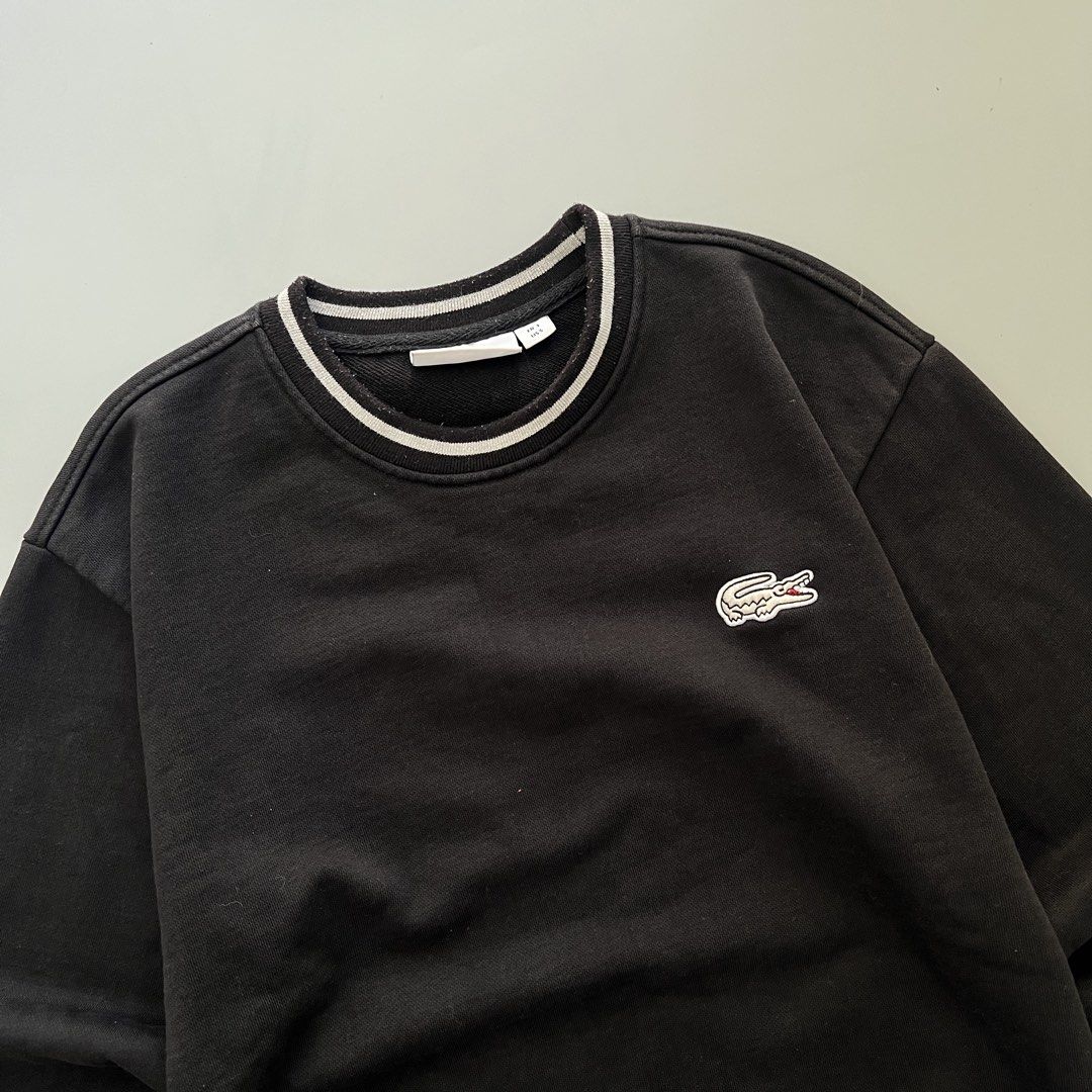 Lacoste Sport Black Sweatshirt (Category: Coats, Jackets and Outerwear) located in Imus. Submitted by cedrickger51562 (Listing ID 1425469186, Image 2). Description: Lacoste Sports Crewneck Gliters Small on tag 19.5 x 24 Excellent condition color rate : 9.5/10 No issue.