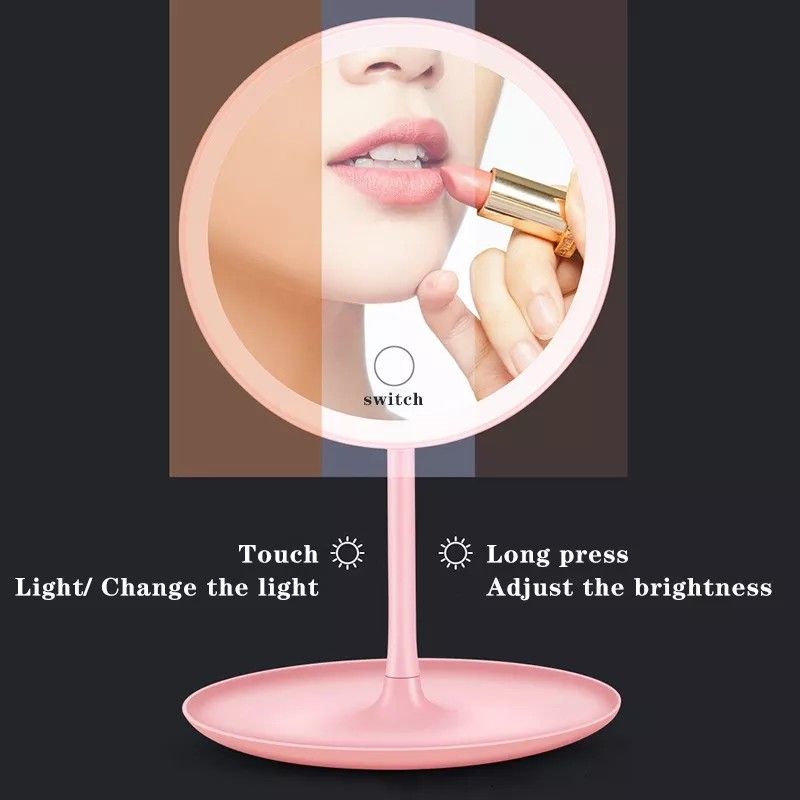 LED Makeup Mirror with Adjustable Brightness (Category: Makeup) located in Cebu City. Submitted by gracemarvin06 (Listing ID 1425542651, Image 1). Description: LED makeup mirror features a touch-sensitive switch to change the light and a long press function to adjust the brightness. It has a circular design with a built-in LED light for optimal illumination. The mirror is pink and has a stable base. Perfect for applying makeup or skincare routine