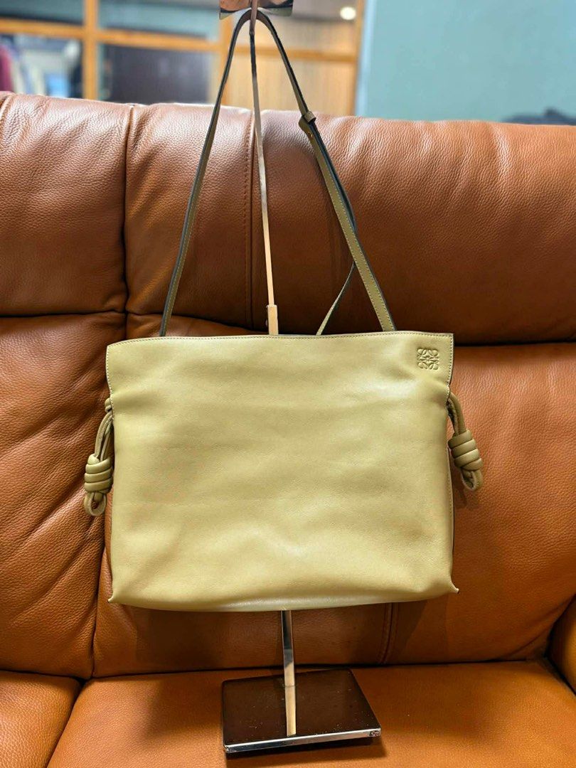 Loewe Leather Tote Bag (Beige) (Category: Luxury Bags & Wallets) located in Pasay City. Submitted by angeeeende_ (Listing ID 1425593289, Image 3). Description: ‼️ not guaranteed ‼️ -elegeant beige leather with embossed LOEWE logo -minimalist design with knotted side details -spacious interior with magnetic closure -includes dust bag - condition: perfect for everyday use ✨ 🪷onhand, ready for delivery / pick up mode of payment: GCASH & Bank Transf