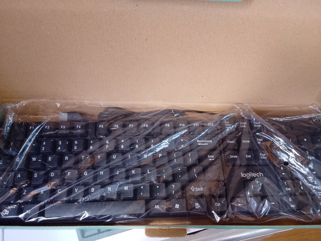 Logitech K-290 and Dell Business Keyboards (Category: Computer Keyboard) located in Cebu City. Submitted by gracemarvin06 (Listing ID 1425494625, Image 3). Description: Key Technical Specifications: Connection: USB-A Wired (Plug-and-Play) Cable Length: Typically 1.5 meters to 1.8 meters Layout: Full-size (104/105 keys) with numeric keypad Key Type: Membrane (often low-profile) Key Lifespan: $\sim$10,000,000 keystrokes Dimensions: Approx. 440–450m