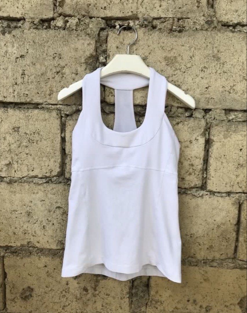 Lululemon white sports top (Category: Activewear) located in Mandaluyong City. Submitted by coco.label (Listing ID 1425542116, Image 1). Description: Lululemon dot 6 .