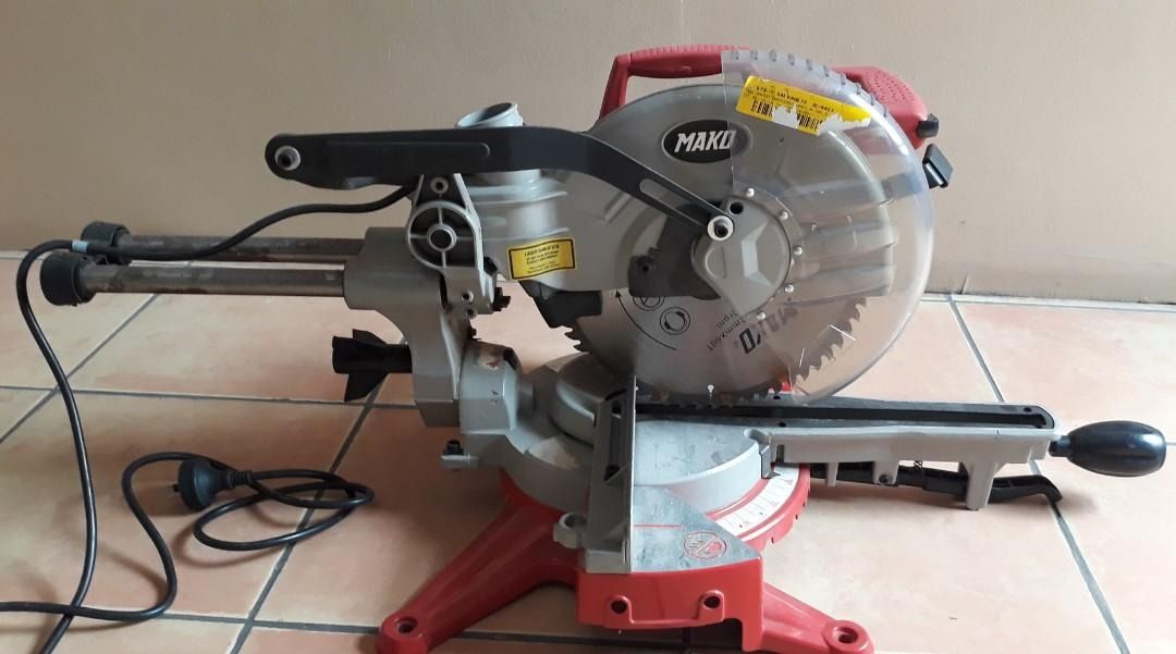 Mako 1800W Sliding Miter Saw (Category: Everything Else Others) located in Manila. Submitted by dnd11 (Listing ID 1425631043, Image 1). Description: Mako 1800W Sliding Miter Saw Voltage 230V-240V, 50Hz Rating - 1800W No load Speed - 5000RPM Saw Blade - 250mm/10" x 30 x 3.2mm, 60T With 10" Blade, Dust bag, Side support and extra carbon brush. Note: No clamp included.