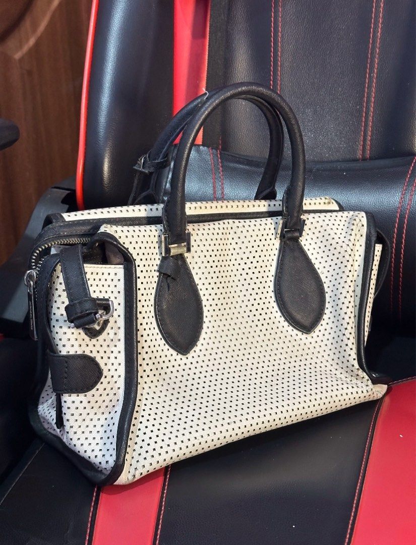 Michael Kors Black and Cream Satchel (Category: Luxury Bags & Wallets) located in Davao. Submitted by bydonbu (Listing ID 1425616431, Image 3). Description: super pretty, classy and very spacious issues (last photo) aren’t that visible in person dm me for more infos.