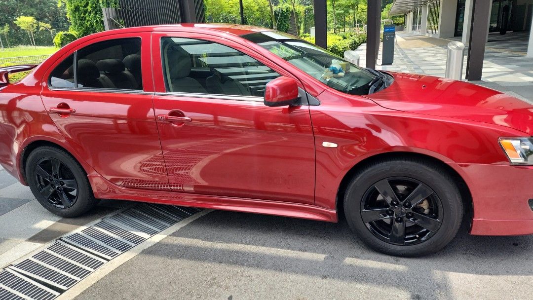 Mitsubishi Lancer EX 2.0 (A) (Category: Used Cars) located in Singapore. Submitted by pineapplepen13 (Listing ID 1425483898, Image 1). Description: well, its over 15 years car. just 2 owners. take a look and view for yourself. coe till 2028. Find your own loan. there are some damage on the left rear. pm if u keen..