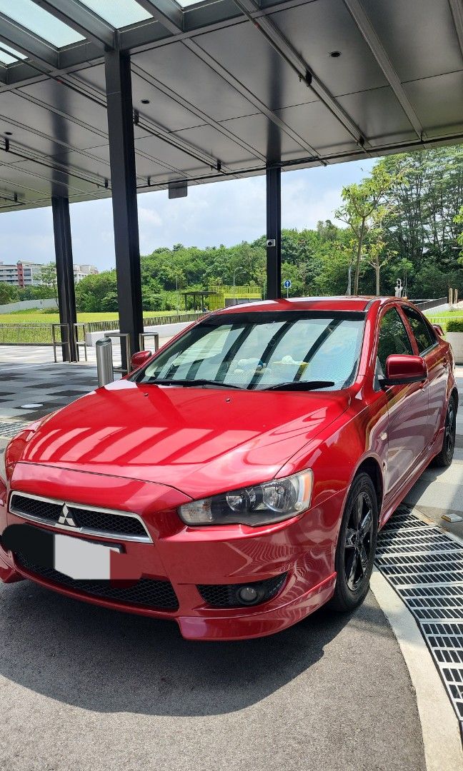 Mitsubishi Lancer EX 2.0 (A) (Category: Used Cars) located in Singapore. Submitted by pineapplepen13 (Listing ID 1425483898, Image 2). Description: well, its over 15 years car. just 2 owners. take a look and view for yourself. coe till 2028. Find your own loan. there are some damage on the left rear. pm if u keen..