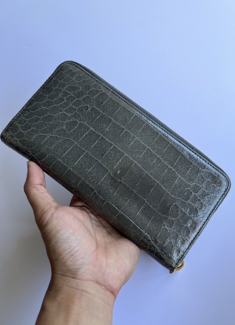 MIU MIU - CROCODILE EMBOSSED LEATHER ZIP AROUND WALLET (Category: Luxury Bags & Wallets) located in Cavite. Submitted by _Gizmo (Listing ID 1425531773, Image 2). Description: Miu Miu - Crocodile Embossed Leather Zip Around Wallet Measurement Width: 8’ Inch Height: 4.5’ Inch Rank AB Normal sign of wear Made In Turkey .