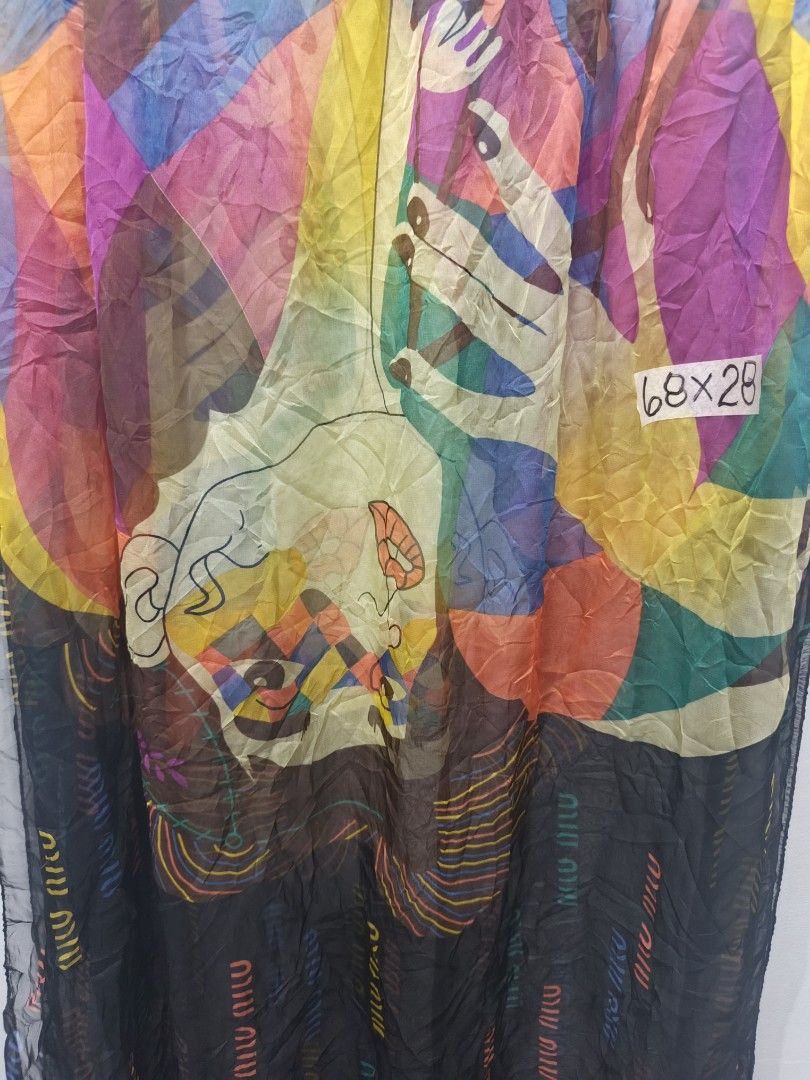 Miu Miu Harlequin Silk Scarf (Category: Luxury Accessories) located in Leyte. Submitted by chaem89 (Listing ID 1425599222, Image 2). Description: Limited Edition Miu Miu Harlequin silk scarf. Features a colorful geometric and artistic design. The scarf is made in Italy and is 100% silk. The scarf has the Miu Miu logo printed on it. The dimensions are approximately 68x28 inches. .