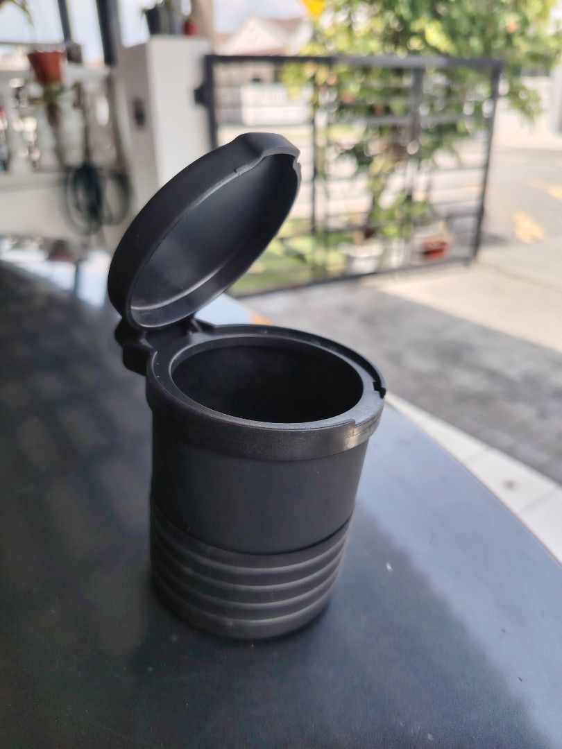 Multipurpose Container (Category: Others) located in Kuala Lumpur. Submitted by syahniz.store (Listing ID 1425580893, Image 2). Description: Multipurpose container. It is designed to hold small items like coins and candies. The container has a lid that opens and closes. It is black in color..