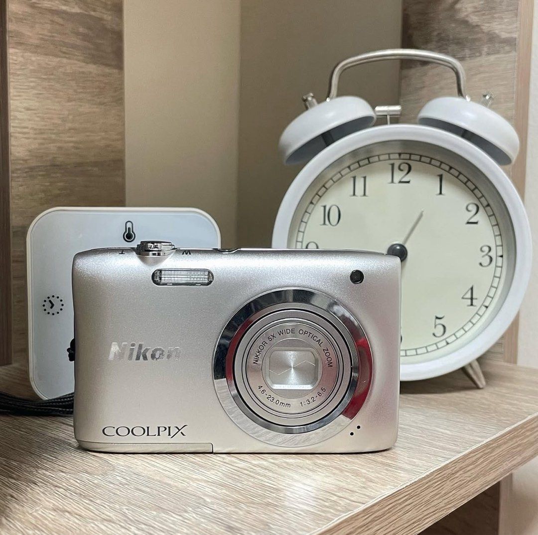 Nikon COOLPIX Digital Camera (Category: Cameras) located in Manila. Submitted by ysaguev (Listing ID 1425522323, Image 1). Description: Nikon Coolpix S2700 in (silver) Details 14mp+ 6xzoom like new condition super clear & dreamy output smooth vid & great audio 20+ scene modes!! CCD (good for vlogging) excellent camera performance Vintage like output super slim & compact no cover on the charging port lang ! inclusions - Unit - Charger - Camera Cas