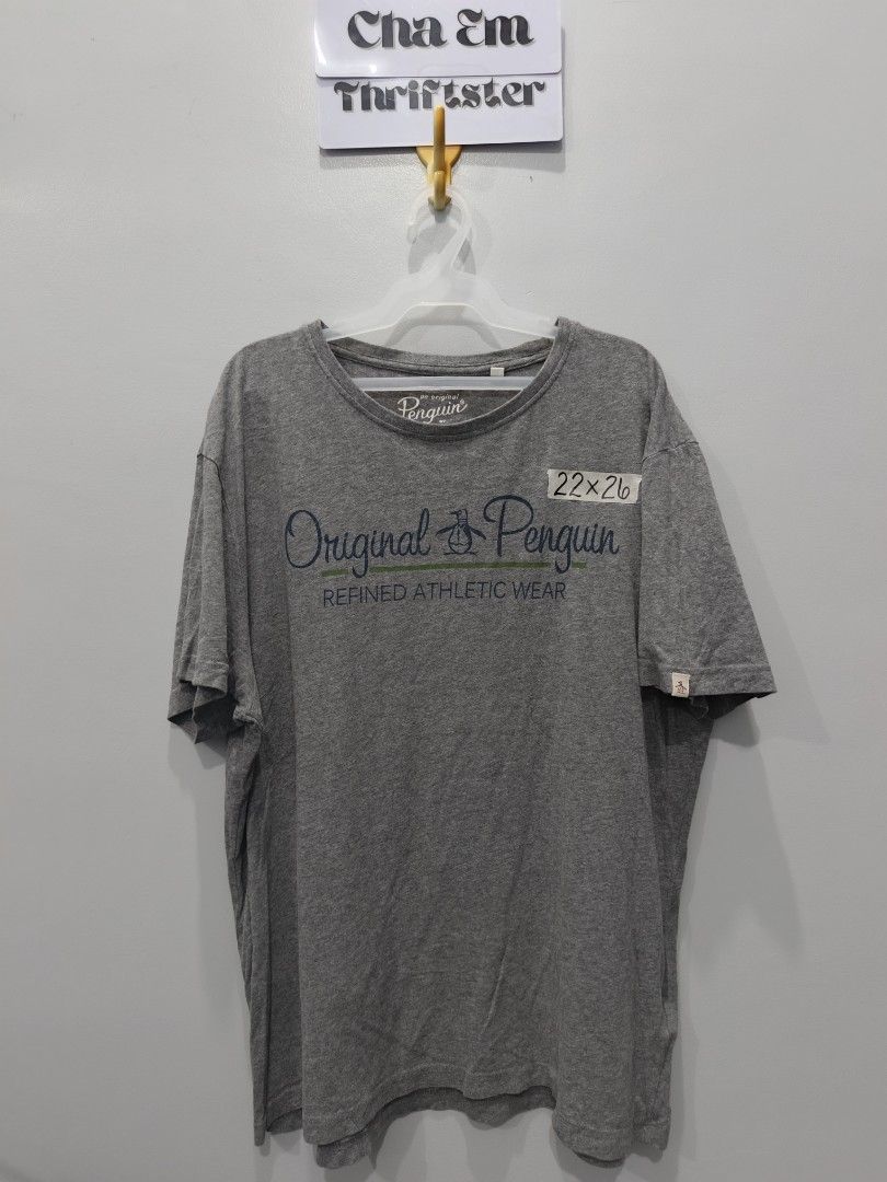 Penguin Gray T-shirt (Category: Tshirts & Polo Shirts ) located in Leyte. Submitted by chaem89 (Listing ID 1425581682, Image 1). Description: Original Penguin gray t-shirt. Features the brand's logo on the front. Made of 70% cotton and 30% viscose. Made in Bangladesh. The shirt has a crew neck and short sleeves. The shirt has a refined athletic wear design. -Excellent Condition -sz M on tag 22x26.