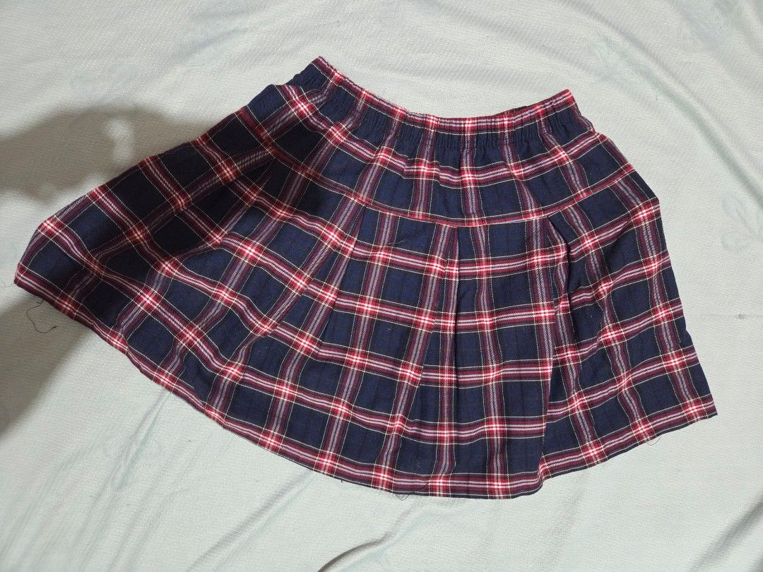 Plaid Pleated Skirt (Category: Skirts) located in Manila. Submitted by declutterwtly (Listing ID 1425475549, Image 1). Description: k Kindly DM for your offers, TYSM! 💌 -Navy blue and red plaid pleated skirt. -The skirt has a classic A-line shape. -The skirt is a versatile piece that can be dressed up or down..