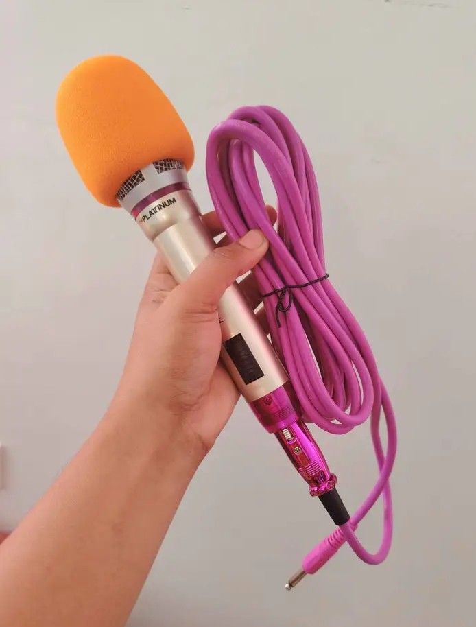 Platinum KS-9000H Dynamic Microphone (Category: Microphones) located in Cebu City. Submitted by gracemarvin06 (Listing ID 1425454077, Image 2). Description: Platinum KS-9000H dynamic microphone. Includes a pink cable and orange foam cover. The microphone is gold and silver in color. The box is included. Perfect for vocal concerts, narration, and gathering news..
