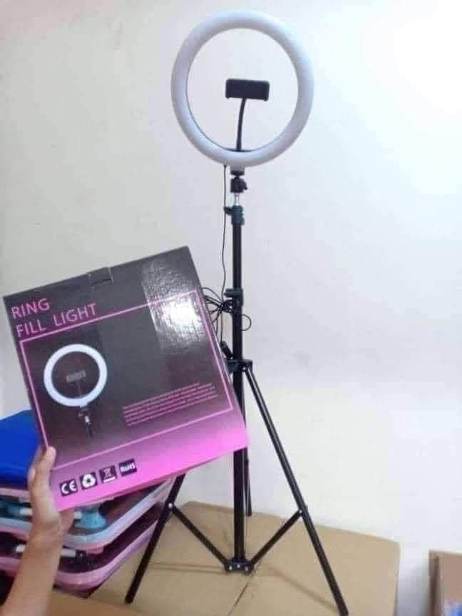 Ringlight with Stand (Category: Lighting) located in Cebu City. Submitted by gracemarvin06 (Listing ID 1425543151, Image 1). Description: - Ringlight with Stand - Provides even and flattering lighting - Ideal for photos, videos, and live streaming - Adjustable stand for versatile use.