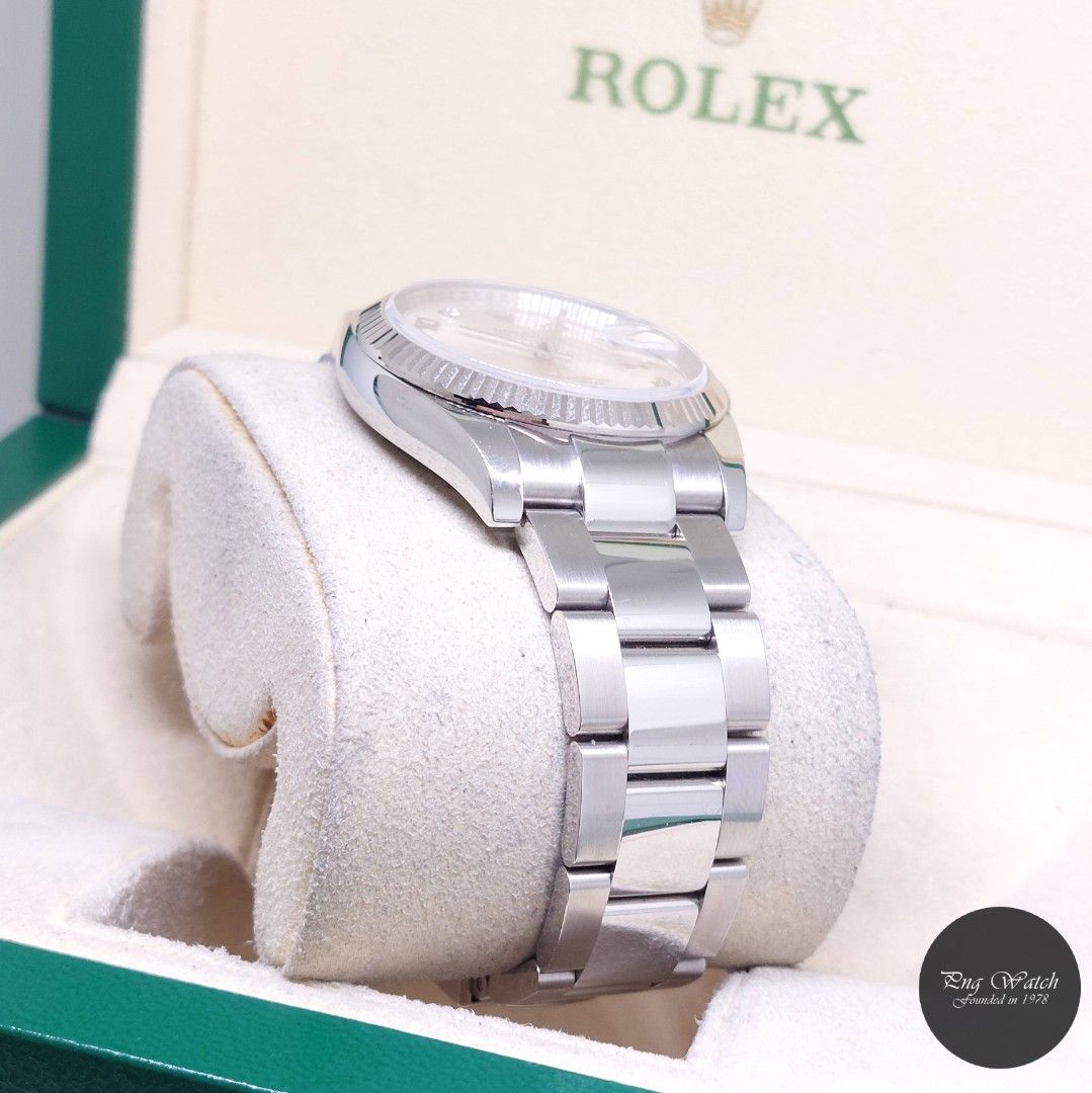 Rolex 34mm Silver Diamonds Dial Oyster Perpetual Date REF: 115234 (Box & Cert-Z Series) (Category: Watches) located in Singapore. Submitted by pngwatchdealer (Listing ID 1425608950, Image 3). Description: [SPECIFICATIONS] **Watch comes in full option (Box and Cert)** **Straight bracelet** **Full links** Brand: Rolex Model: Oyster Perpetual Date 34mm Silver Diamonds Dial (REF: 115234)(Z)(07)(O) Movement: Automatic (Self-Winding) Functions and Feat
