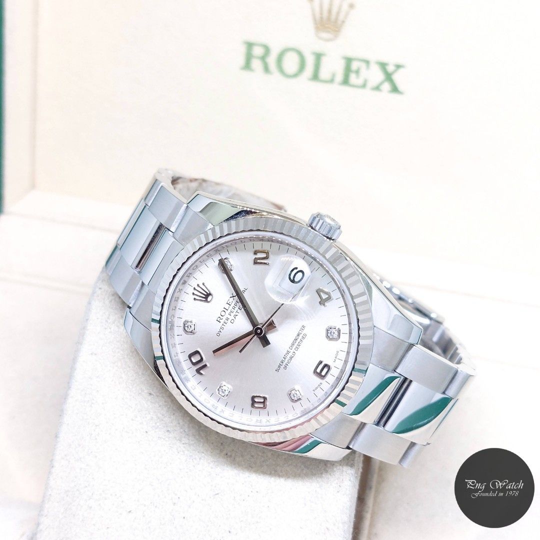 Rolex 34mm Silver Diamonds Dial Oyster Perpetual Date REF: 115234 (Box & Cert-Z Series) (Category: Watches) located in Singapore. Submitted by pngwatchdealer (Listing ID 1425608950, Image 1). Description: [SPECIFICATIONS] **Watch comes in full option (Box and Cert)** **Straight bracelet** **Full links** Brand: Rolex Model: Oyster Perpetual Date 34mm Silver Diamonds Dial (REF: 115234)(Z)(07)(O) Movement: Automatic (Self-Winding) Functions and Feat