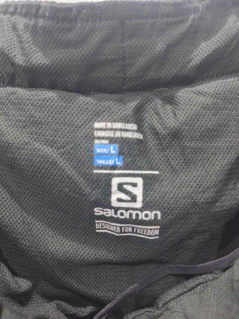Salomon Black Shorts - Size L (Category: Shorts) located in Leyte. Submitted by chaem89 (Listing ID 1425577980, Image 3). Description: Black Salomon shorts. Features a drawstring waist and a small Salomon logo on the front. The shorts have a back pocke. Made in Bangladesh. Designed for freedom. Excellent Cond sz L on tag 32-36x20.