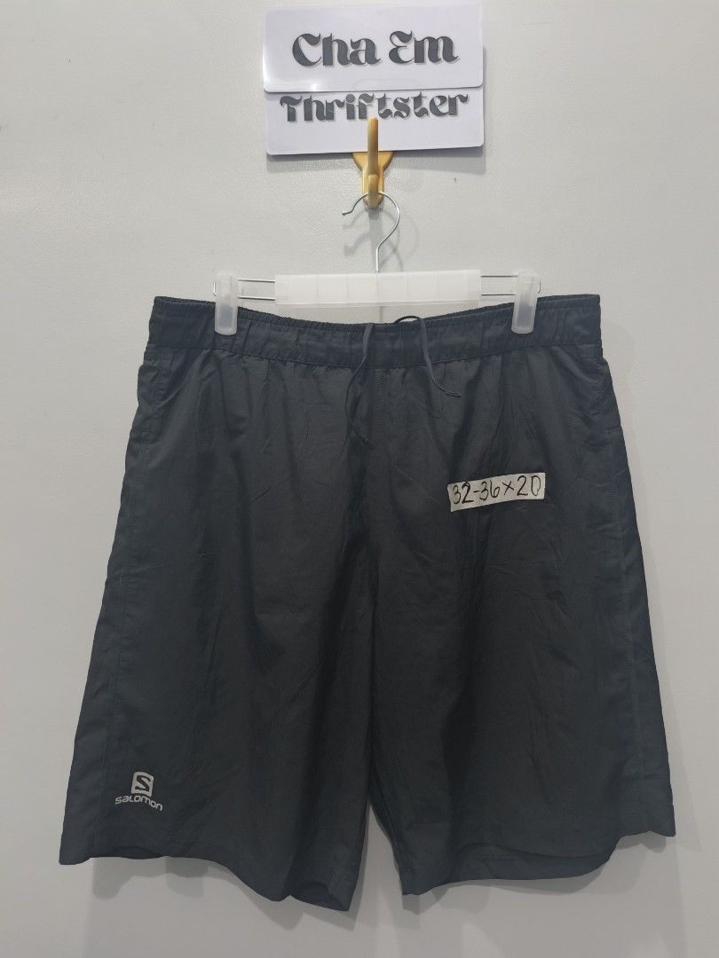 Salomon Black Shorts - Size L (Category: Shorts) located in Leyte. Submitted by chaem89 (Listing ID 1425577980, Image 1). Description: Black Salomon shorts. Features a drawstring waist and a small Salomon logo on the front. The shorts have a back pocke. Made in Bangladesh. Designed for freedom. Excellent Cond sz L on tag 32-36x20.