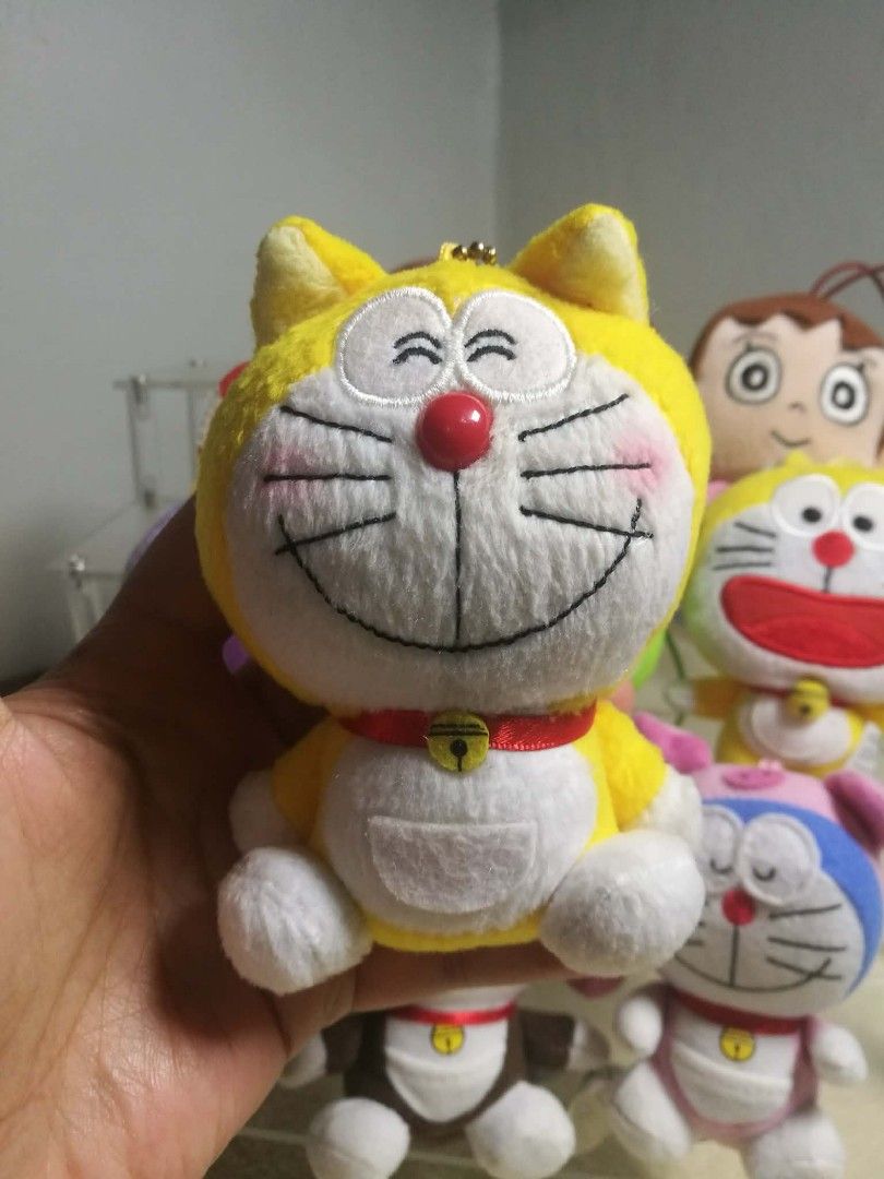 Set Doraemon Plush Keychain (Category: Character Goods) located in Baguio. Submitted by boxmania (Listing ID 1425618827, Image 2). Description: Bundle 9 pcs some charm-key ring some charm-purse some charm-ID holder From HK/UK/Dubai/Canada or Japan Surplus Box What you see is what you get No return, no exchange (random item po nakukuha ng seller sa box).
