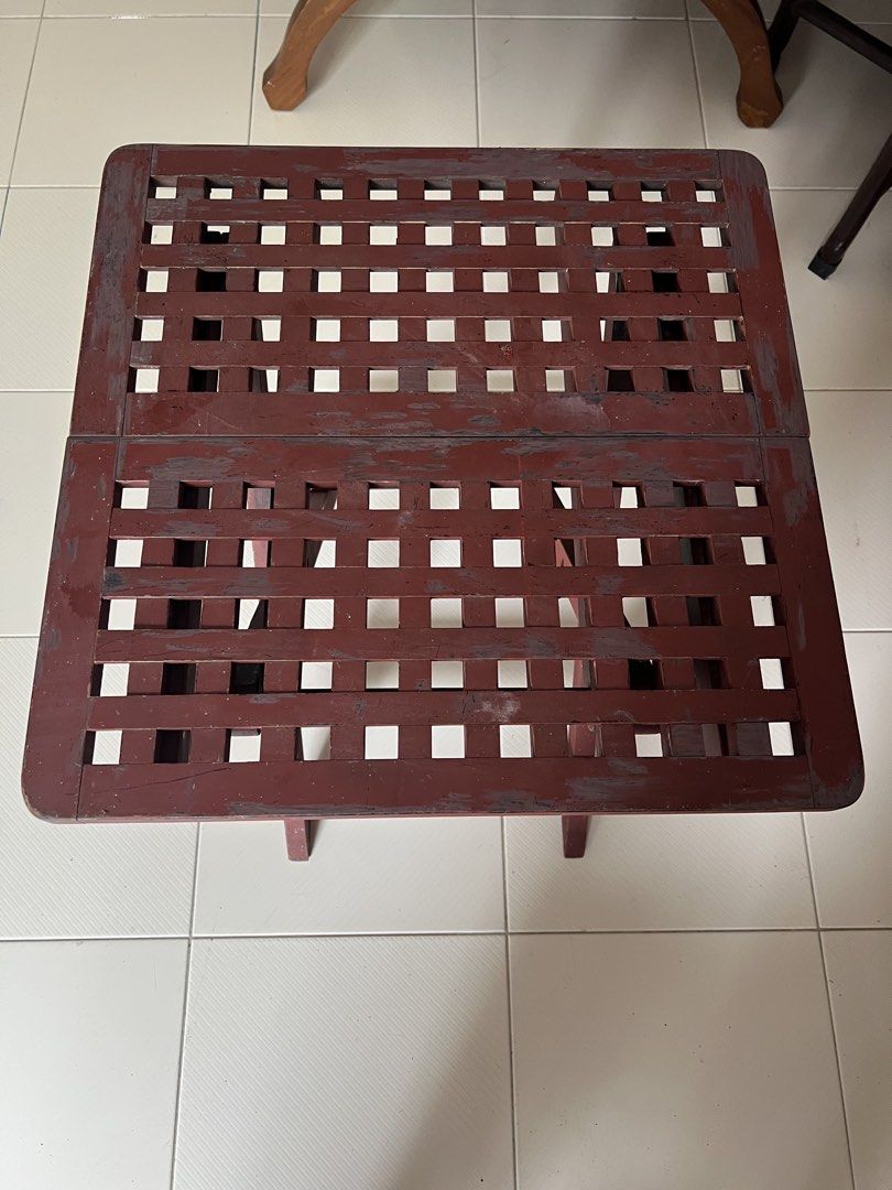 Solid wood foldable side table (Category: Tables & Sets) located in Singapore. Submitted by msjanis (Listing ID 1425524017, Image 1). Description: A solid wood side table Space-saving design Easy storage Dimensions: 50x50x50cm Pickup at Bedok South.