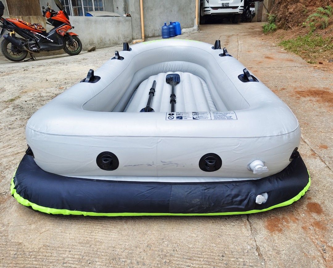 Sport Life Inflatable Rubber Dinghy Boat (Category: Water Sports) located in Baguio. Submitted by mljhardtoy (Listing ID 1425513580, Image 3). Description: HEAVY-DUTY INFLATABLE FISHING BOAT CANOE ✅ 4 person capacity ✅ Includes 2 inflatable cushions for seating and two paddles for maneuvering. ✅ Constructed from durable, heavy-duty PVC with an Oxford fabric cover for enhanced protection against abrasions. .