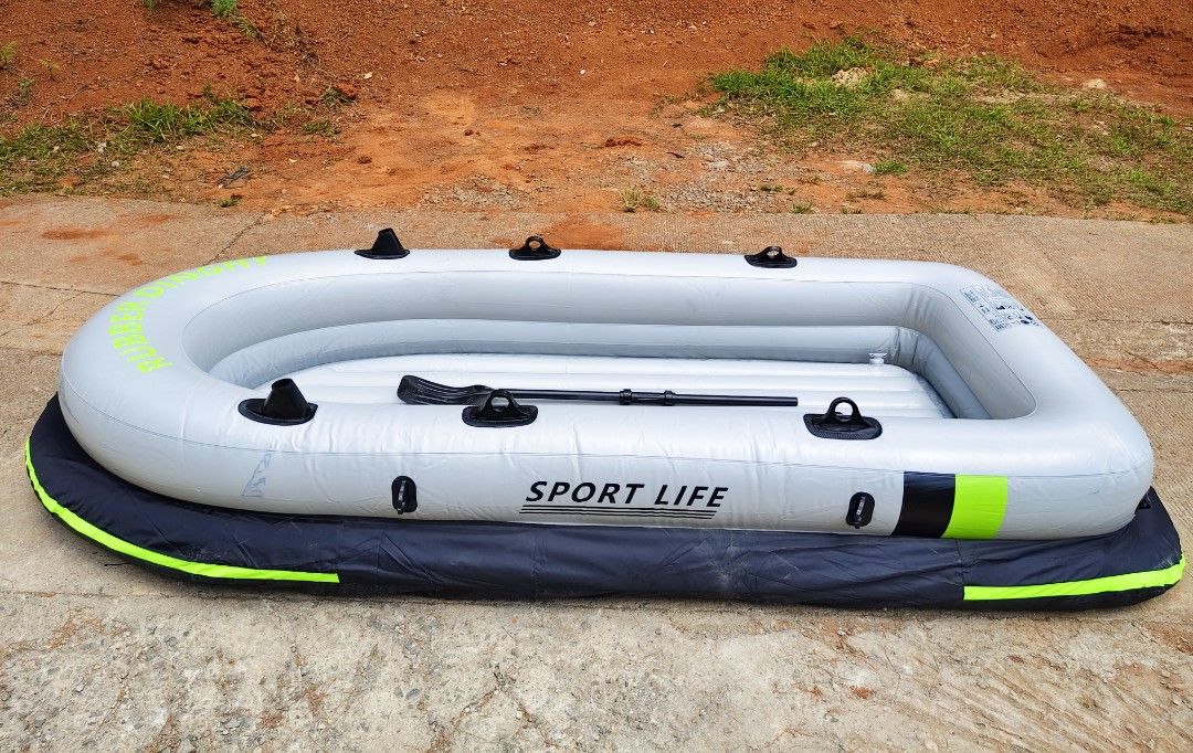 Sport Life Inflatable Rubber Dinghy Boat (Category: Water Sports) located in Baguio. Submitted by mljhardtoy (Listing ID 1425513580, Image 2). Description: HEAVY-DUTY INFLATABLE FISHING BOAT CANOE ✅ 4 person capacity ✅ Includes 2 inflatable cushions for seating and two paddles for maneuvering. ✅ Constructed from durable, heavy-duty PVC with an Oxford fabric cover for enhanced protection against abrasions. .