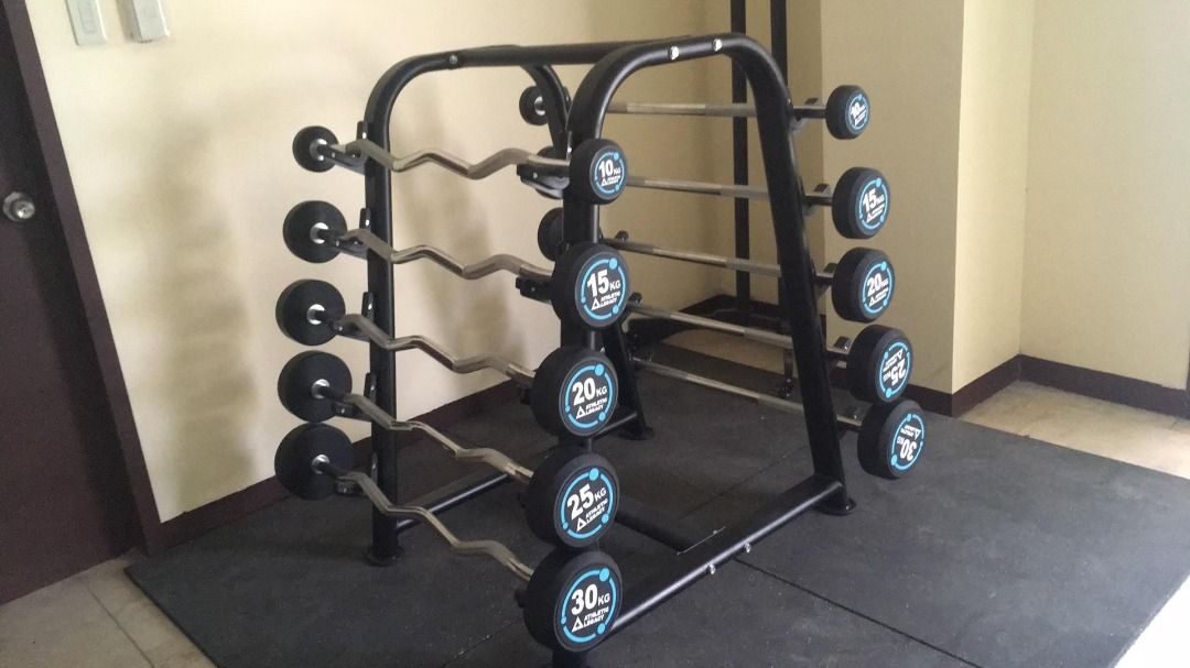Straight & EZ Curl Barbell Set with Rack (Category: Weights & Dumbbells) located in Cavite. Submitted by silent_queen0105 (Listing ID 1425495300, Image 2). Description: Available Styles: ✅ Straight Bar: Perfect for heavy presses, rows, and classic curls. ✅ EZ Curl Bar: Ergonomic grip to reduce wrist strain—ideal for bicep peaks and tricep extensions. Weight Options: 10kg | 15kg | 20kg | 25kg | 30kg.