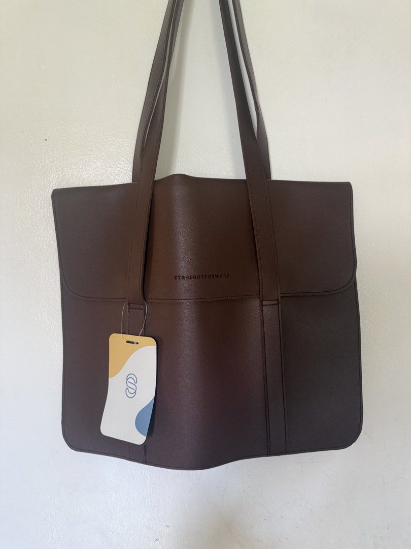 Straightforward Brown Tote Bag DVL Lacina (Category: Tote Bags) located in Cavite. Submitted by mojacky (Listing ID 1425556783, Image 2). Description: DVL Lacina Height 13 1/2 Width 16 1/2 .