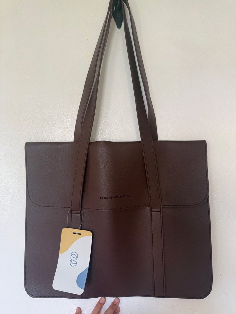 Straightforward Brown Tote Bag DVL Lacina (Category: Tote Bags) located in Cavite. Submitted by mojacky (Listing ID 1425556783, Image 3). Description: DVL Lacina Height 13 1/2 Width 16 1/2 .