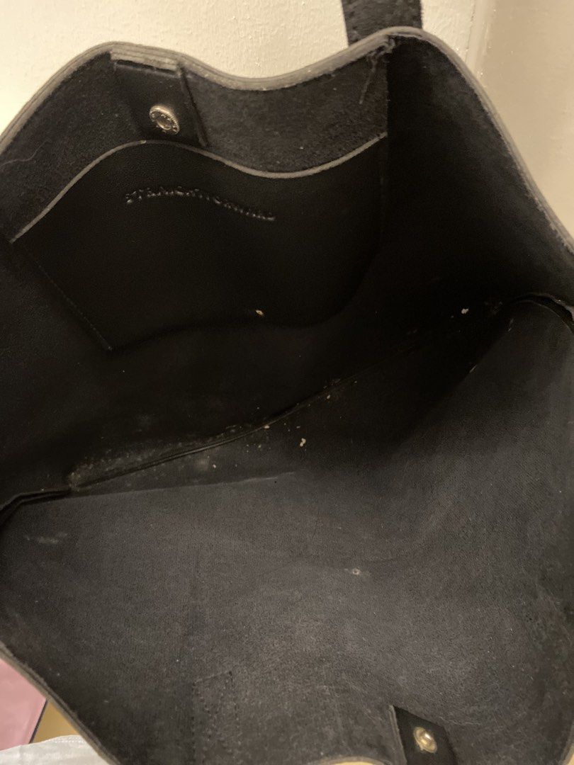 Landscape Straightforward Black Tote Bag (Category: Tote Bags) located in Mandaluyong City. Submitted by weakassbitch (Listing ID 1425562350, Image 3). Description: RUSH SALE!!! - 7/10 condition - Rectangular shape with long handles - Interior has a small pocket and a snap closure.