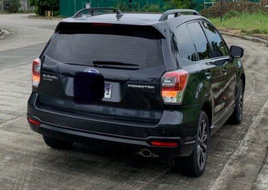 Subaru Forester 2.0 i Premium (A) (Category: Used Cars) located in Paranaque City. Submitted by seky15 (Listing ID 1425450838, Image 3). Description: For Sale: 2018 Subaru Forrester 2.0i Premium Model (Automatic Transmission) Make and Model: 2018 Subaru Forester 2.0i Premium Model (A/T) Selling Price: P620k Color: Dark blue pearl Mileage: 75,000 kilometers With sun roof Well maintained.