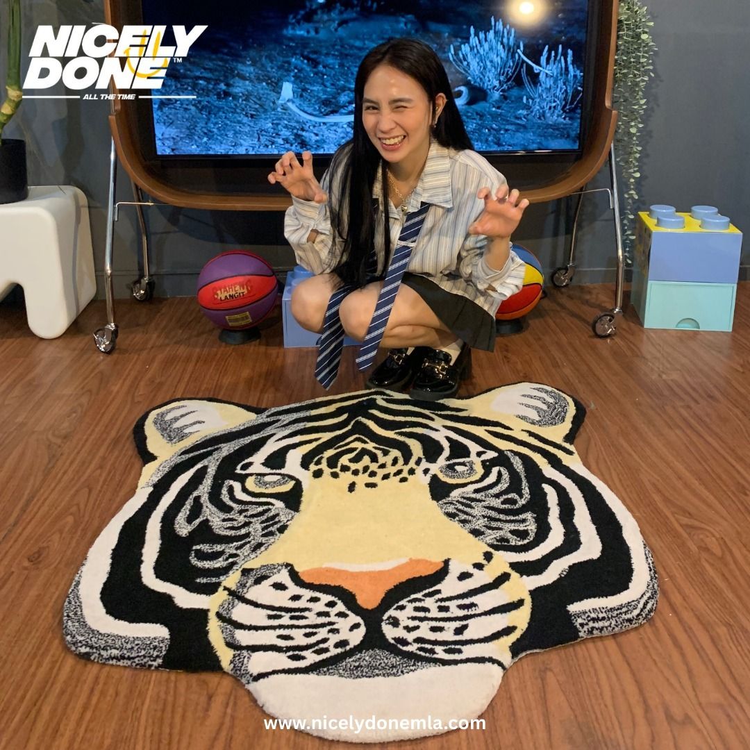 Tiger Face Carpet Rug (Category: Carpets, Mats & Flooring) located in Manila. Submitted by nicelydone31948 (Listing ID 1425450111, Image 2). Description: Unique tiger face rug. Features a black, white, and yellow design. Adds a playful touch to any space. Perfect for bedrooms, living rooms, or play areas. Made from soft material. The rug is shaped like a tiger's head, with detailed facial features..