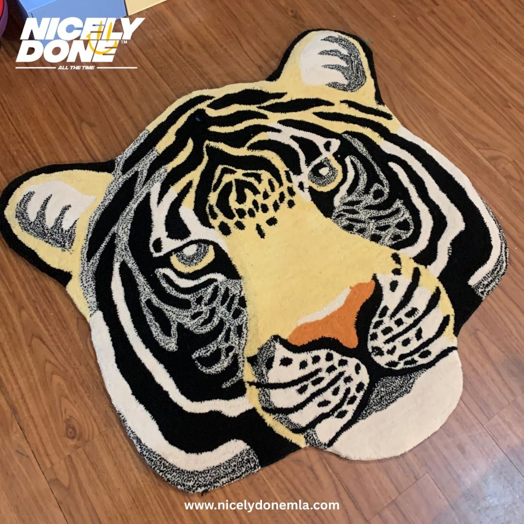 Tiger Face Carpet Rug (Category: Carpets, Mats & Flooring) located in Manila. Submitted by nicelydone31948 (Listing ID 1425450111, Image 3). Description: Unique tiger face rug. Features a black, white, and yellow design. Adds a playful touch to any space. Perfect for bedrooms, living rooms, or play areas. Made from soft material. The rug is shaped like a tiger's head, with detailed facial features..