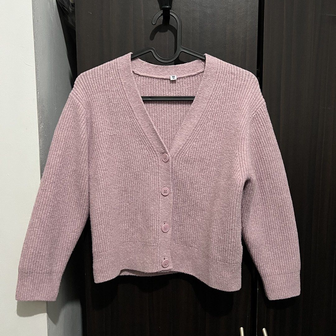 Uniqlo Pink Cardigan (Category: Longsleeves) located in Manila. Submitted by bluetwigs (Listing ID 1425572193, Image 3). Description: - Bought at Uniqlo kids section (size 130) - Used 5x only.