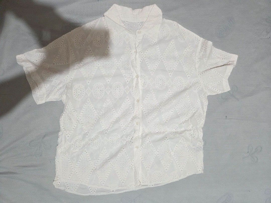 White Eyelet Top (Category: Sleeveless) located in Manila. Submitted by declutterwtly (Listing ID 1425480203, Image 1). Description: Kindly DM me your offers, TYSM 💌 -White eyelet top with button-down closure. -Short sleeves -Detailed geometric pattern. -It has a classic collar and a slightly tailored fit. -The eyelet design adds a touch of elegance and breathability..